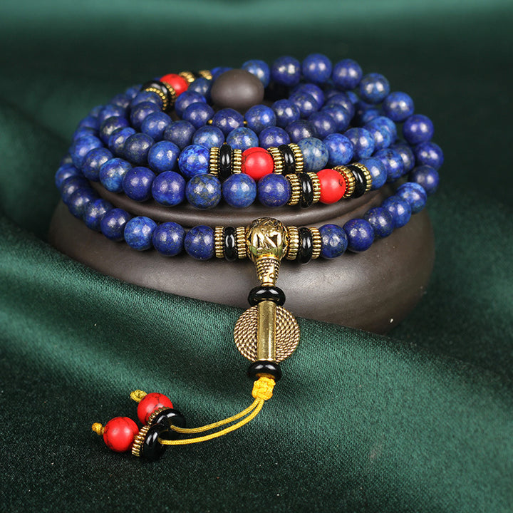 Blue 108-bead lapis lazuli-style mala with red and black accents