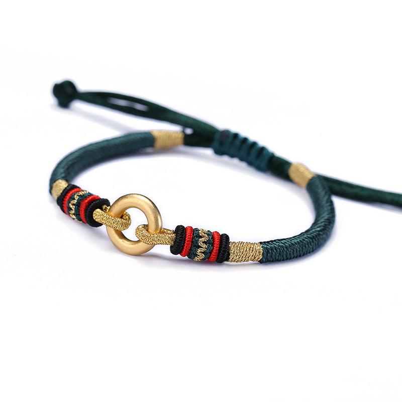 Tibetan-style green bracelet symbolizing resilience, spiritual strength, and a connection to nature.