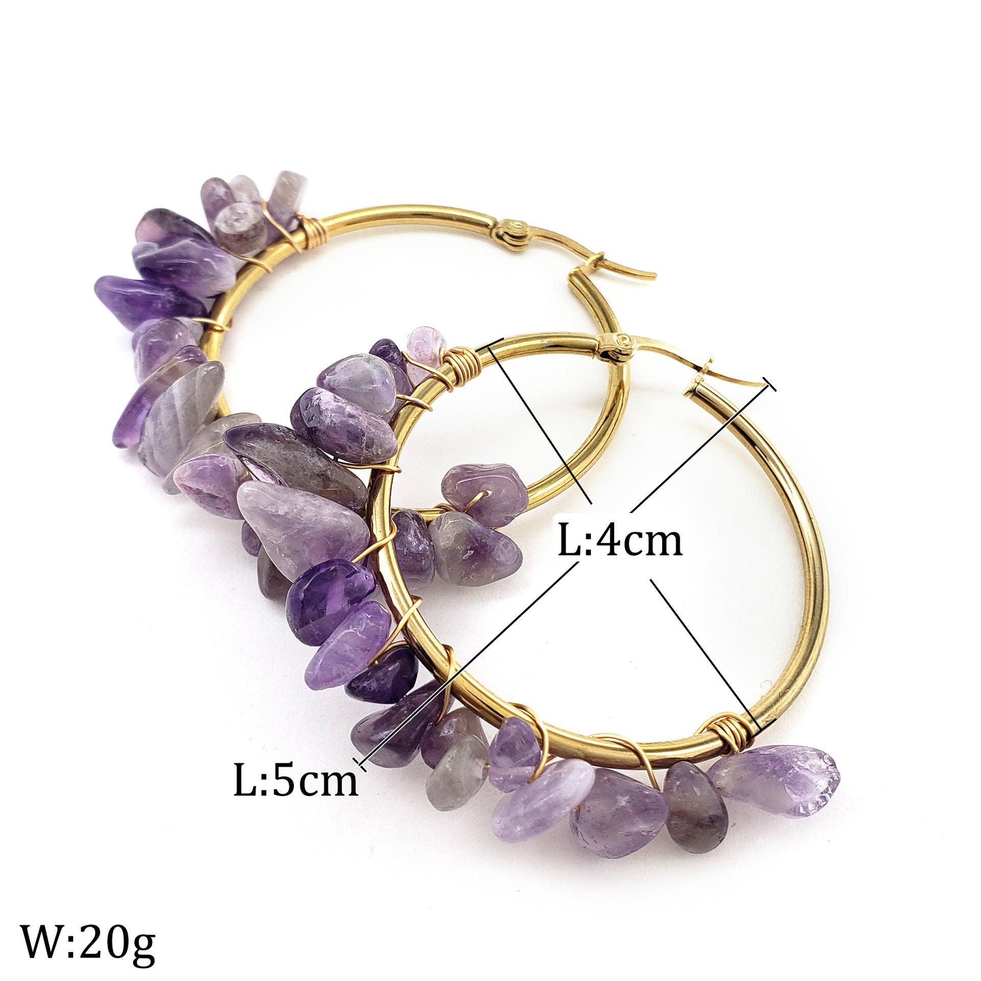 A combination of purple gemstones and gold earrings exudes elegance and mystery. Purple is often seen as a symbol of spiritual power and wisdom, deeply rooted in religious and cultural significance, and is frequently used for meditation and spiritual enhancement.