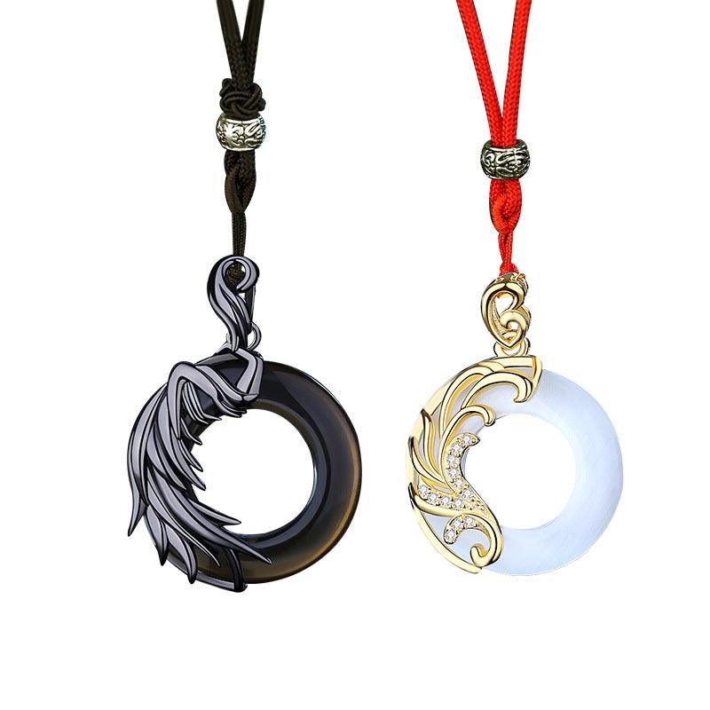An elegant "Angel and Demon" themed necklace, featuring a contrasting design of light and dark circular pendants. This unique necklace symbolizes the balance between light and darkness, making it a meaningful accessory for those who appreciate deeper symbolism in their jewelry.