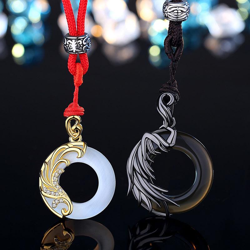 An elegant "Angel and Demon" themed necklace, featuring a contrasting design of light and dark circular pendants. This unique necklace symbolizes the balance between light and darkness, making it a meaningful accessory for those who appreciate deeper symbolism in their jewelry.