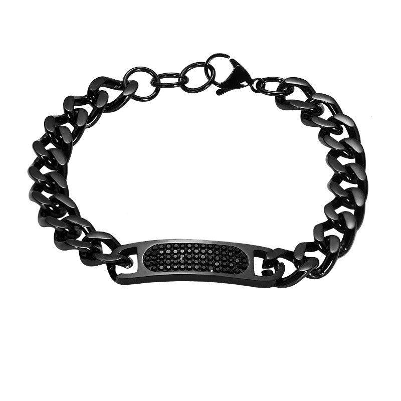 Black stainless steel bracelet with a crystal-encrusted bar, ideal for a statement piece.