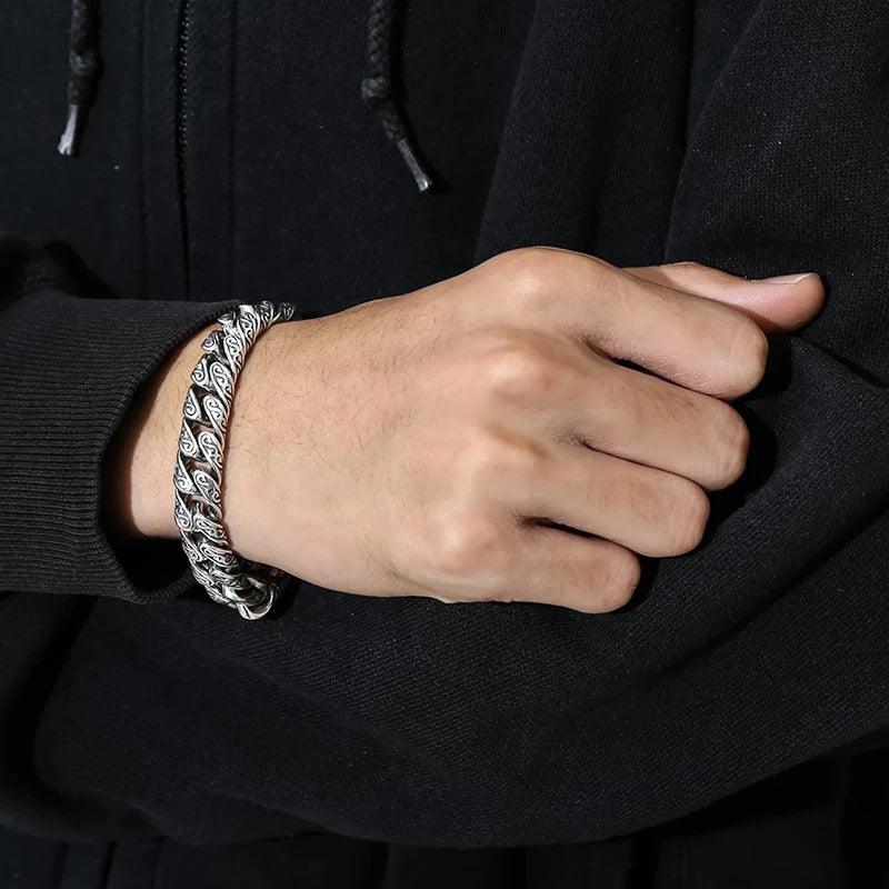 Bracelet on wrist, adding a touch of elegance and power, perfect for those who value sophistication with a bold edge.