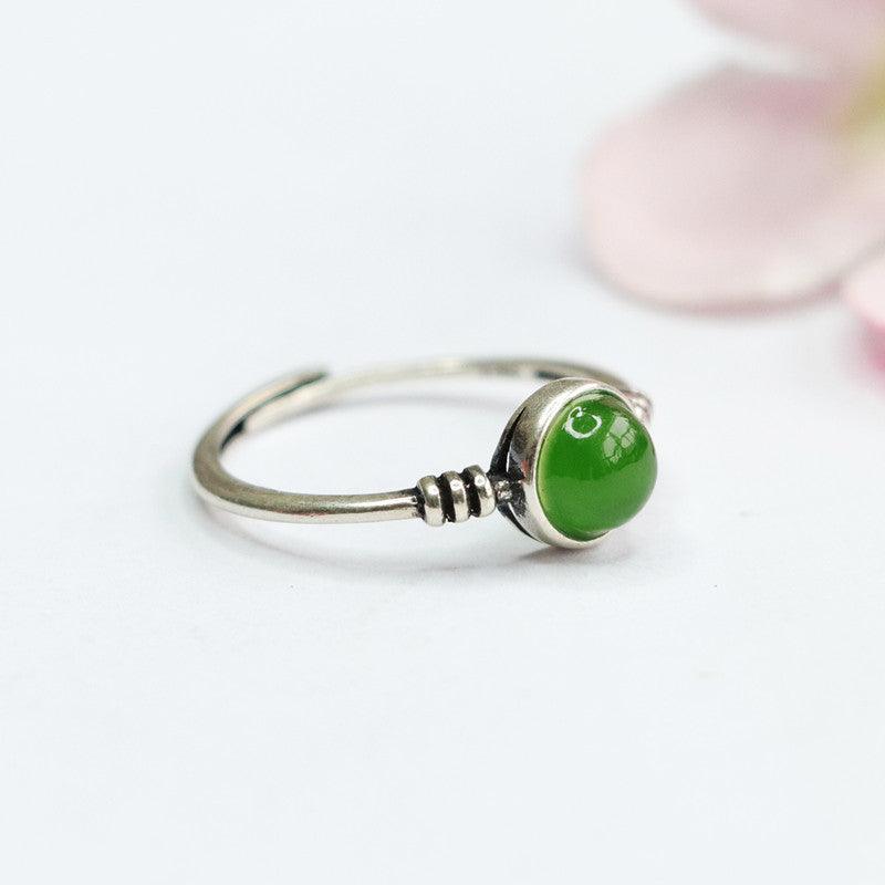 Classic jade and silver ring, ideal for everyday wear or special occasions.