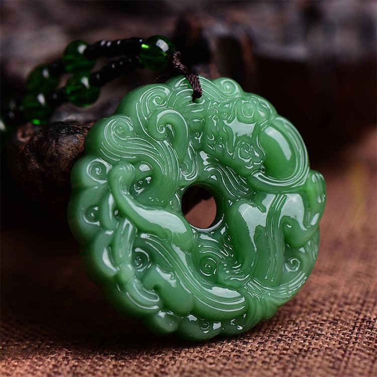 Close-up of the detailed jade carving, featuring traditional motifs that add depth and cultural significance.