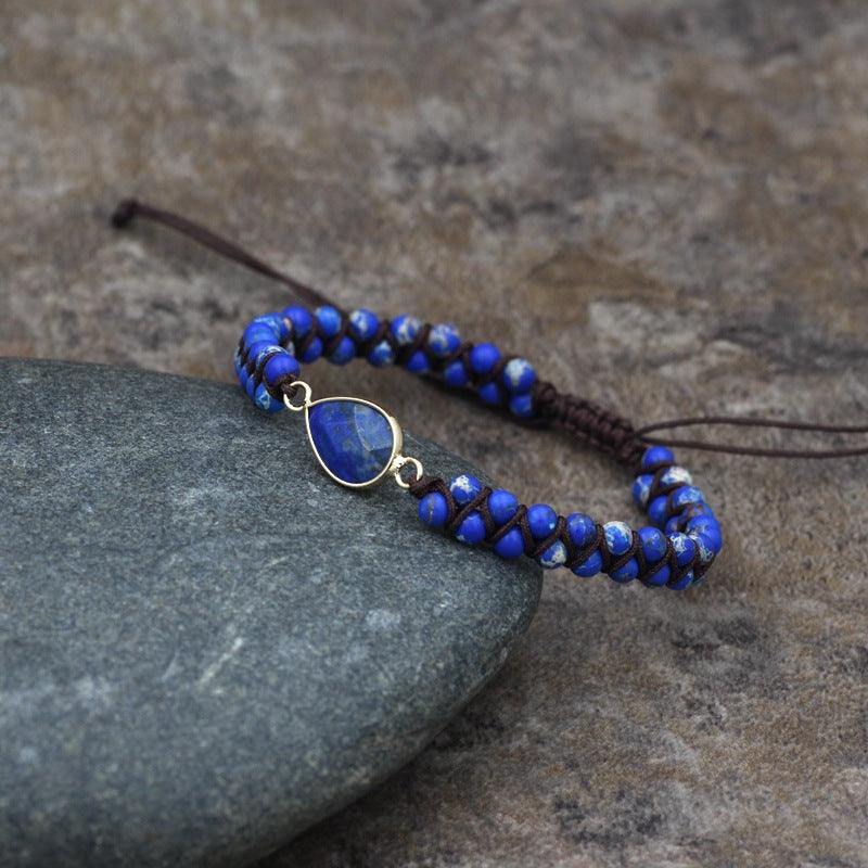 Close-up of the lapis lazuli centerpiece on the bracelet, showcasing the stone’s deep blue hue and smooth finish.