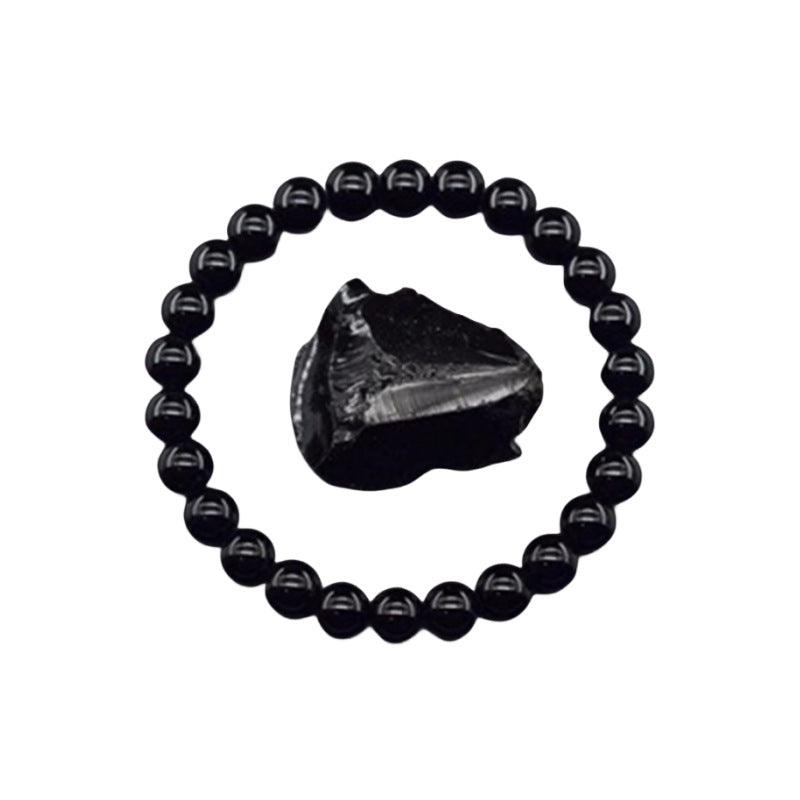 Close-up of the onyx beads, highlighting the stone's natural luster and dark hue.