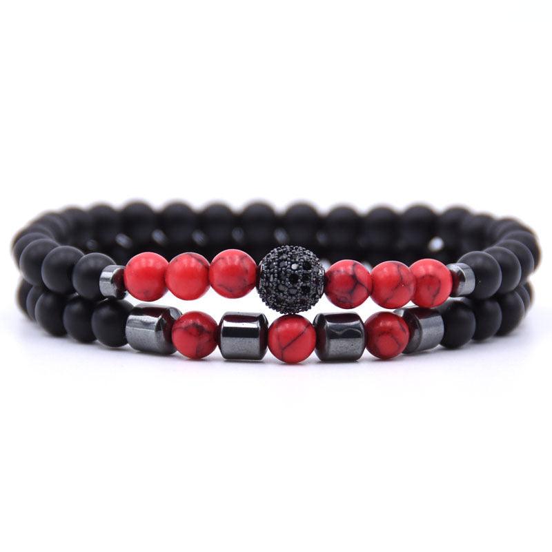 Close-up of the red and black beads, showcasing the vibrant red tones and the matte black finish.