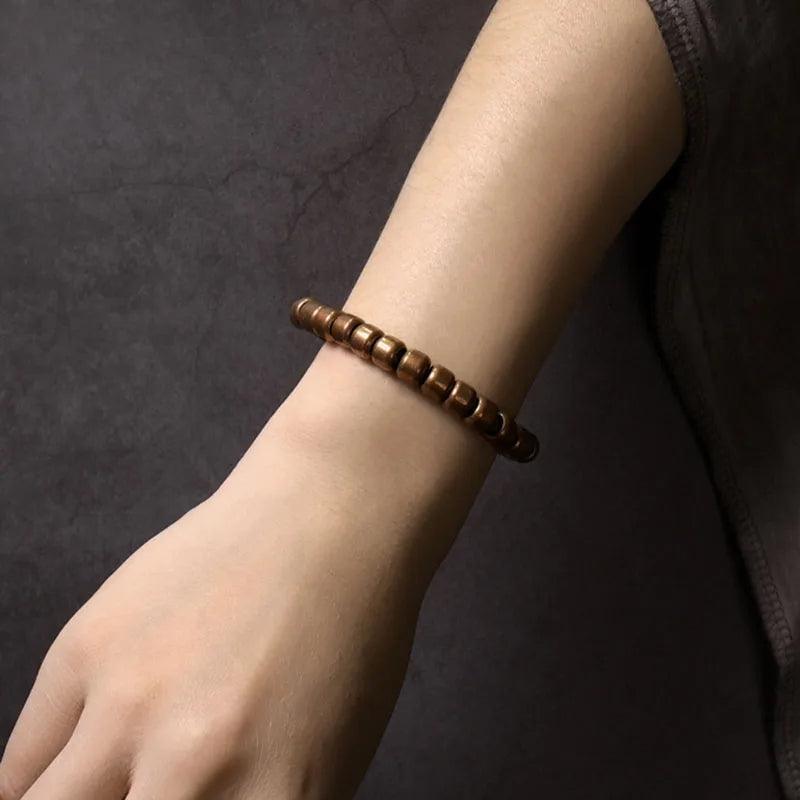 Copper bracelet with a hammered finish, often used in various cultures for its believed grounding and healing properties, perfect for holistic wellness.