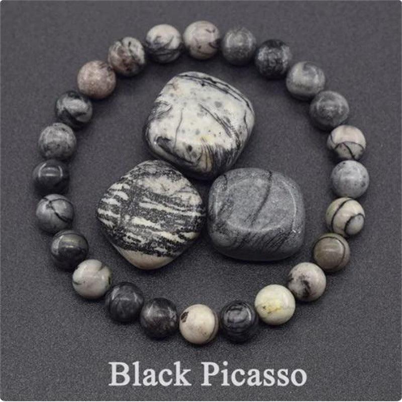 Detailed view of the Black Picasso Jasper bracelet, capturing the harmonious aesthetics and grounding qualities.