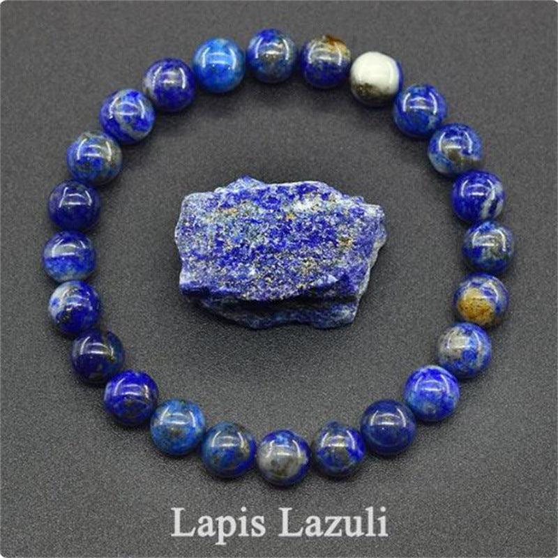 Detailed view of the Lapis Lazuli bracelet, showcasing the intense blue and gold flecks that symbolize clarity and intuition.