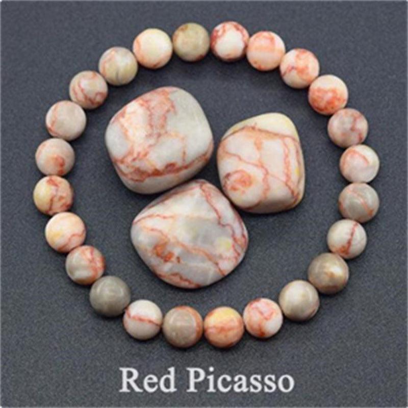 Detailed view of the Red Picasso Jasper bracelet, capturing the earthy tones and intricate lines that bring a sense of creativity and serenity.
