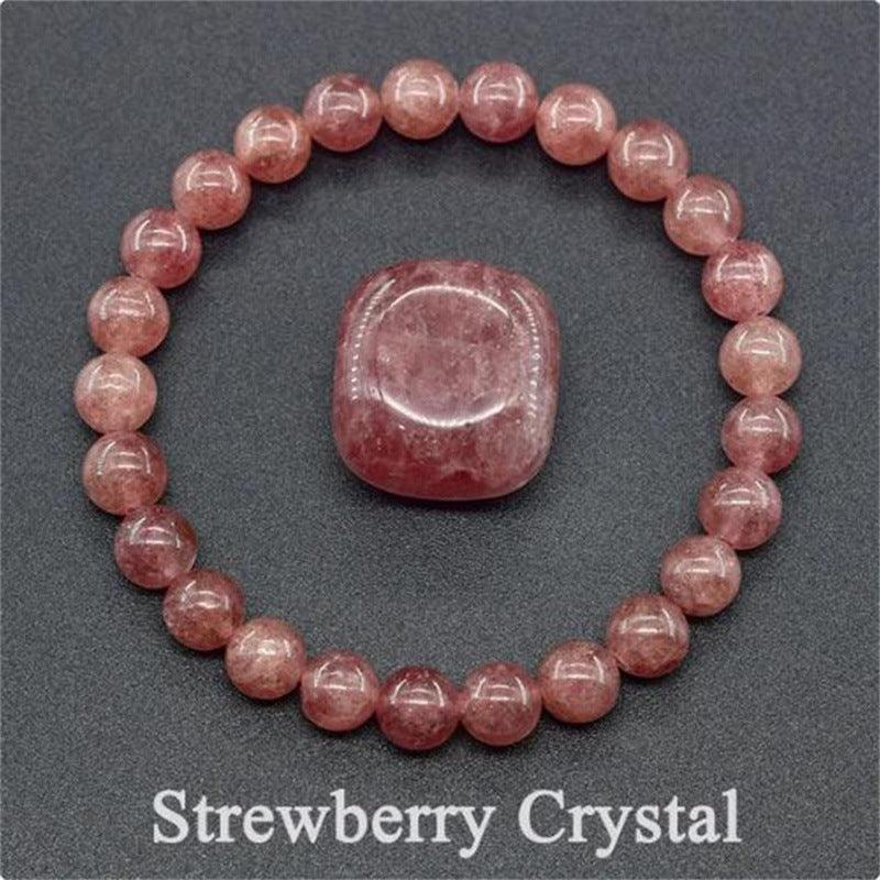 Detailed view of the Strawberry Crystal bracelet, showcasing the soft pink crystals that embody love and positivity.