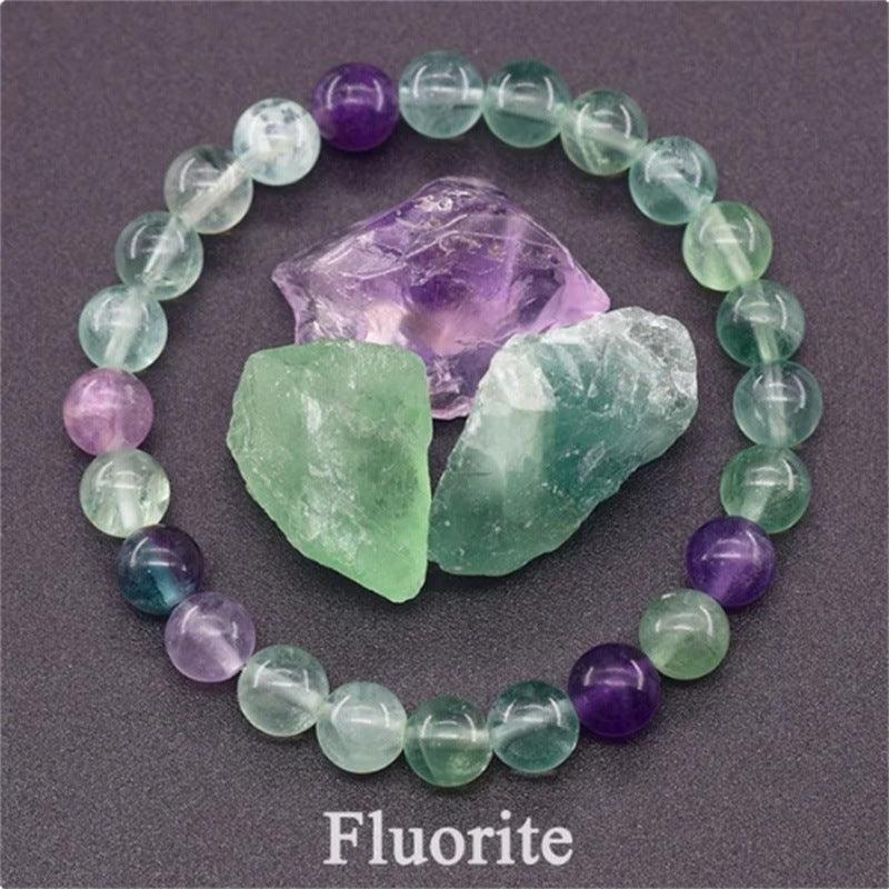 Detailed view of the fluorite bracelet, highlighting the smooth texture and vibrant colors that promote mental clarity.