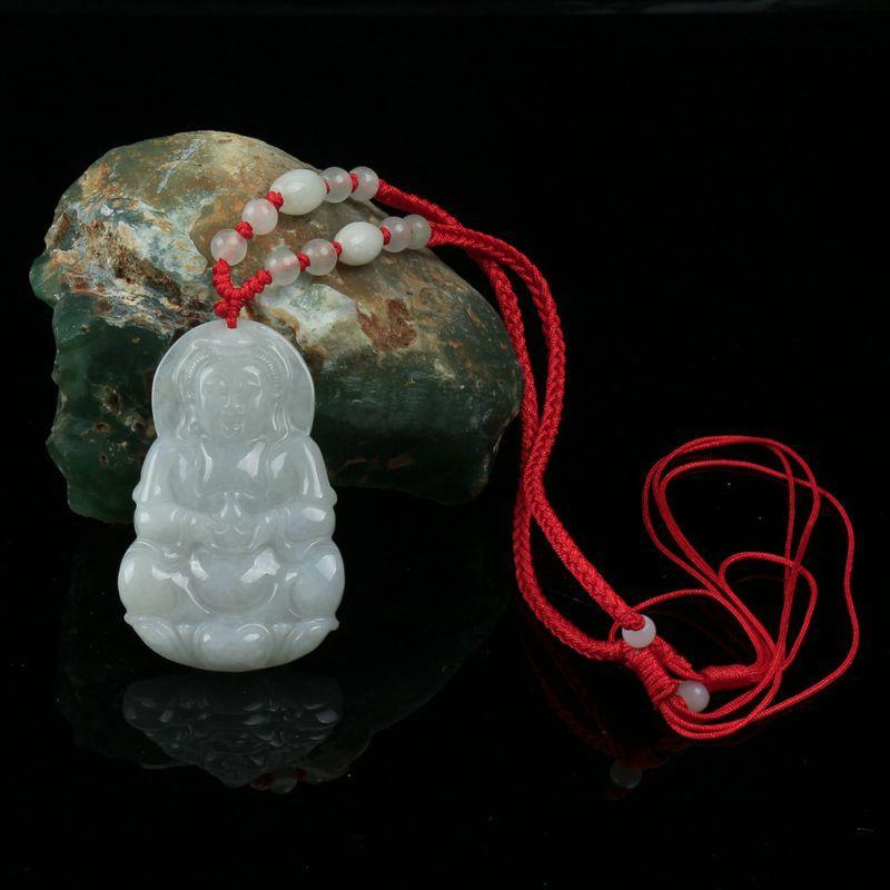 Elegant jade Guanyin pendant with traditional red string necklace, symbolizing protection, compassion, and peace, crafted from natural jade with fine detailing.