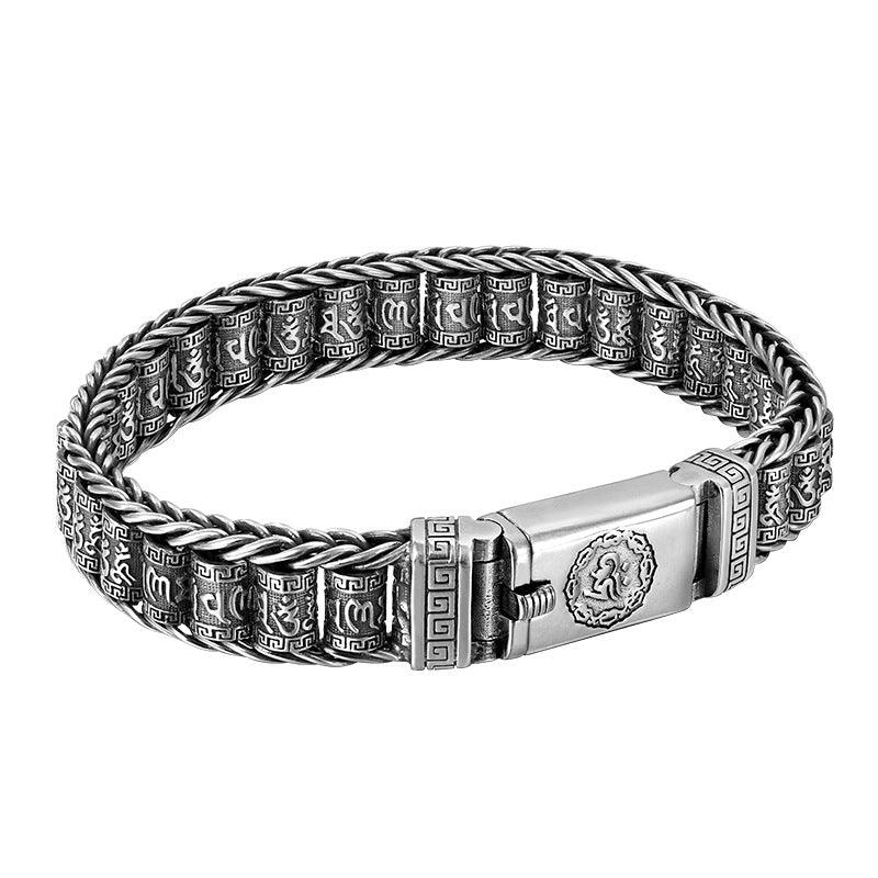 Elegant silver bracelet engraved with the Tibetan Six-Word Mantra, a symbol of wisdom and compassion.