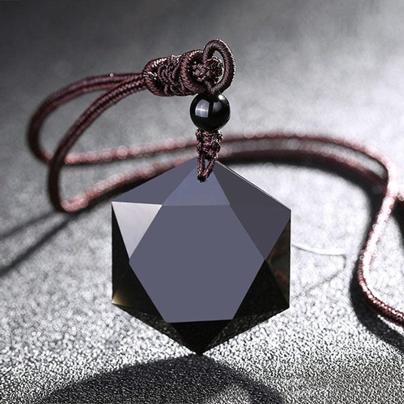 Faceted black obsidian geometric pendant, perfect for modern styling with a touch of grounding energy.