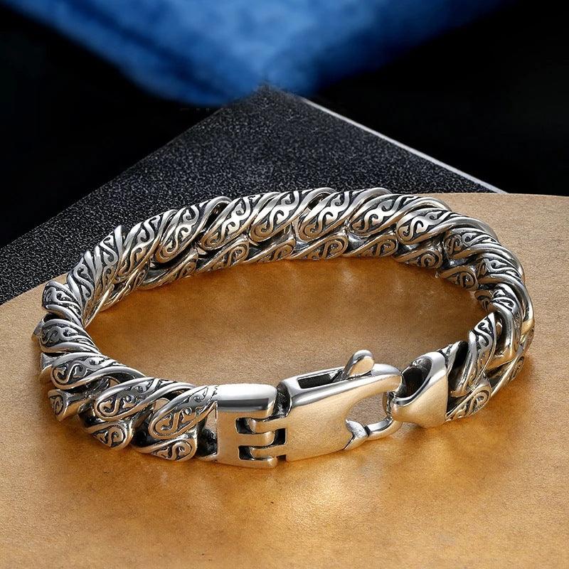 Full view of a 925 sterling silver bracelet with intricate carvings, embodying timeless elegance and durability for any occasion.
