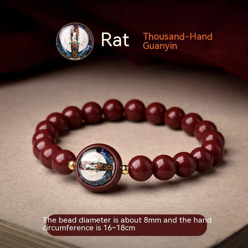 Full view of a cinnabar bracelet featuring Thousand-Hand Guanyin, designed for those born in the Year of the Rat.