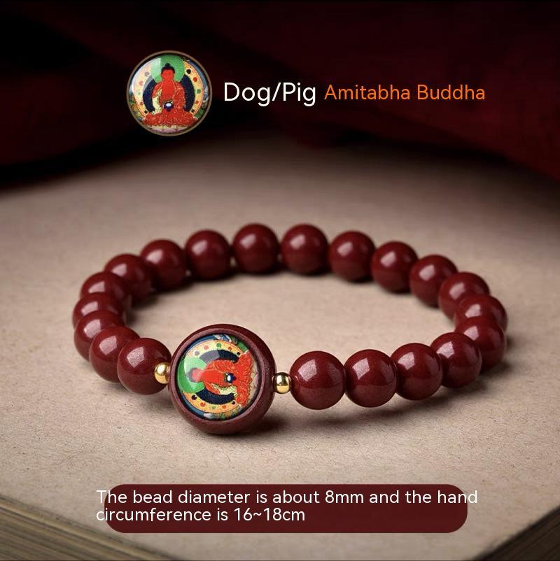 Full view of a cinnabar bracelet featuring the Amitabha Buddha, designed for those born in the Year of the Dog and Pig.