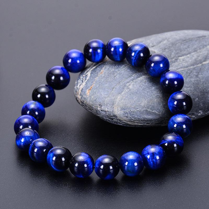 Full view of a deep blue tiger eye stone bracelet, embodying mystique and elegance, perfect for fostering confidence and providing protective energy.