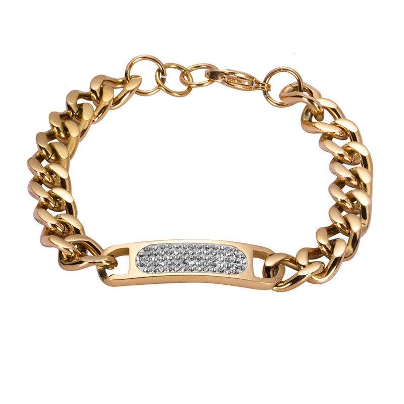 Gold bracelet with a crystal-encrusted bar, ideal for those who love timeless luxury.