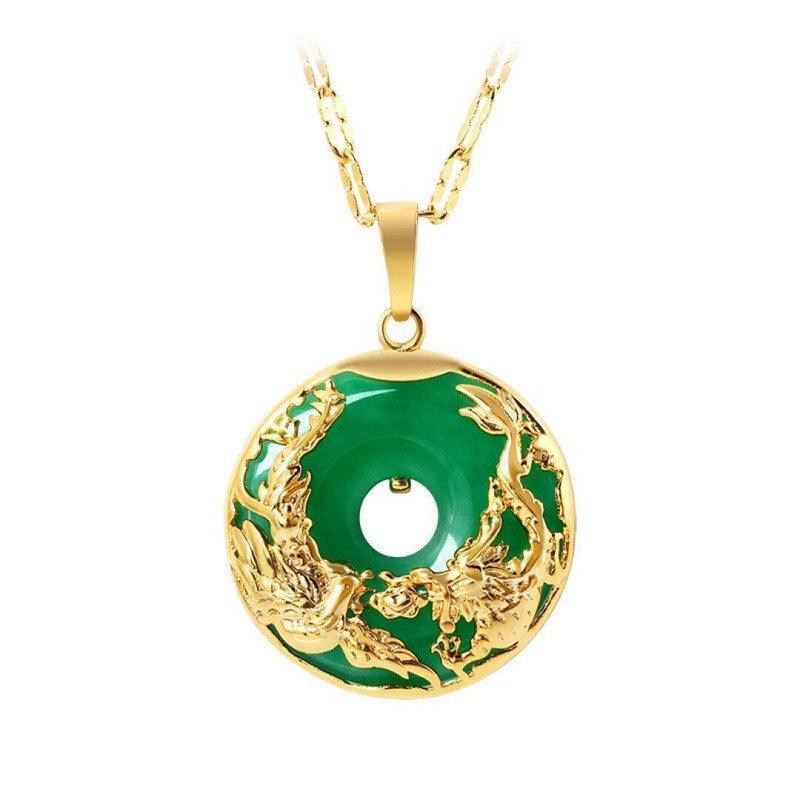 Gold chain paired with the green dragon pendant, illustrating the harmonious combination of rich colors and detailed craftsmanship.