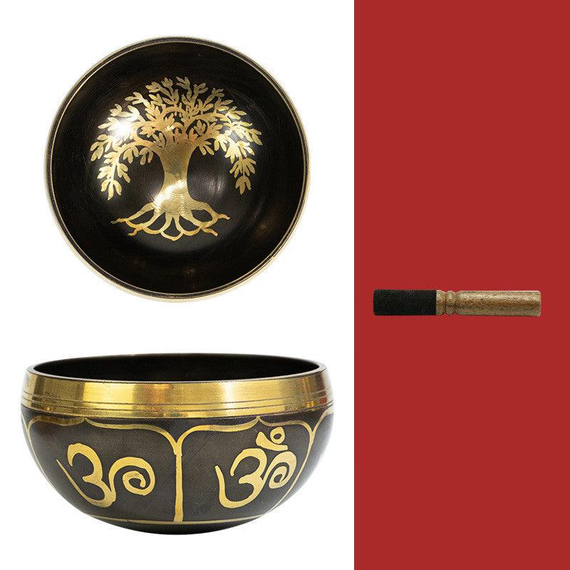 Handcrafted brass singing bowl with ‘Om’ symbol, known for its resonant sound that supports meditation, relaxation, and spiritual grounding.