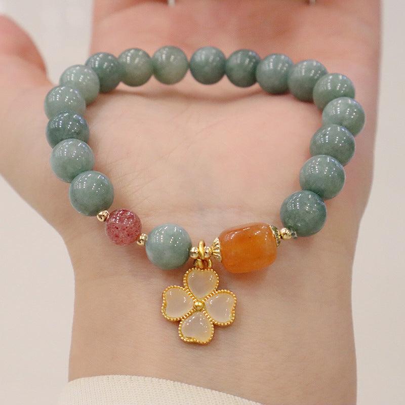 Handcrafted jade, carnelian, and agate bracelet, known for grounding and emotional healing properties, offering a sense of calm to the wearer.
