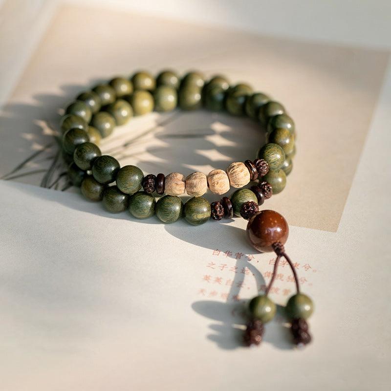 Handmade wooden mala bracelet, ideal for grounding and mindfulness in meditation.
