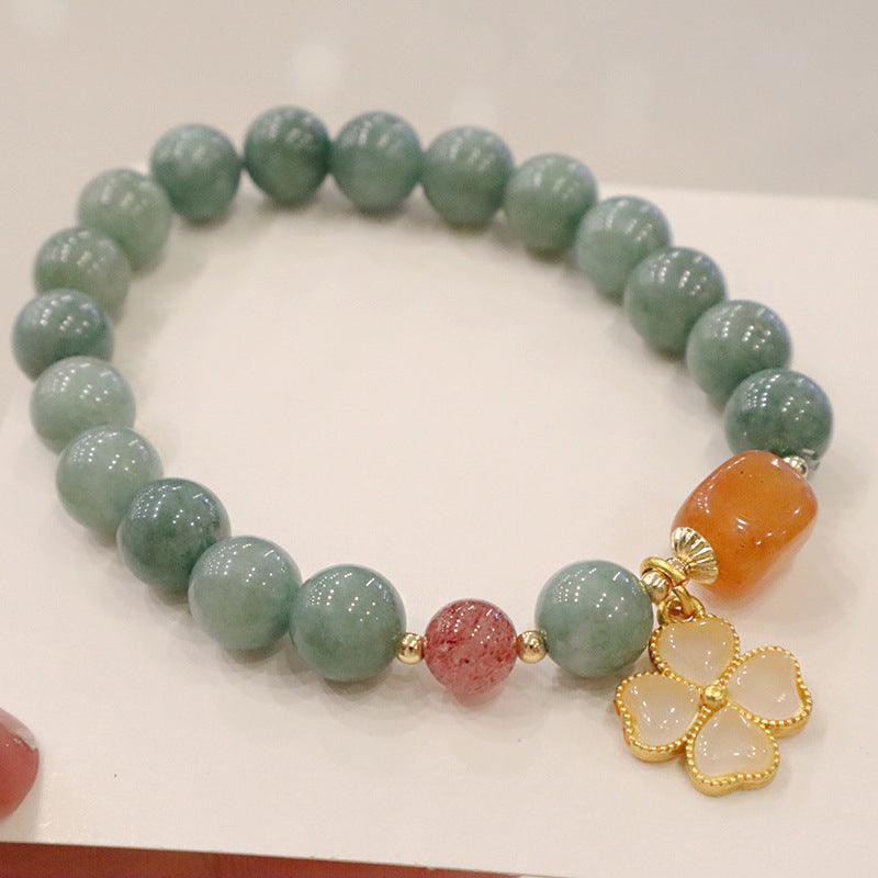 Jade bracelet with a four-leaf clover charm makes a meaningful gift, symbolizing harmony, luck, and inner strength.
