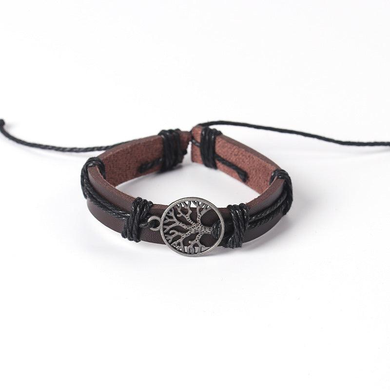 Leather bracelet with intricate Tree of Life charm, a perfect accessory for a meaningful style.