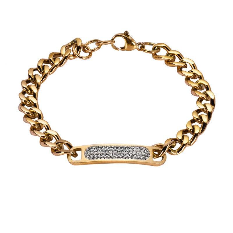 Luxurious gold chain bracelet with a sparkling crystal bar, perfect for adding elegance to any look.