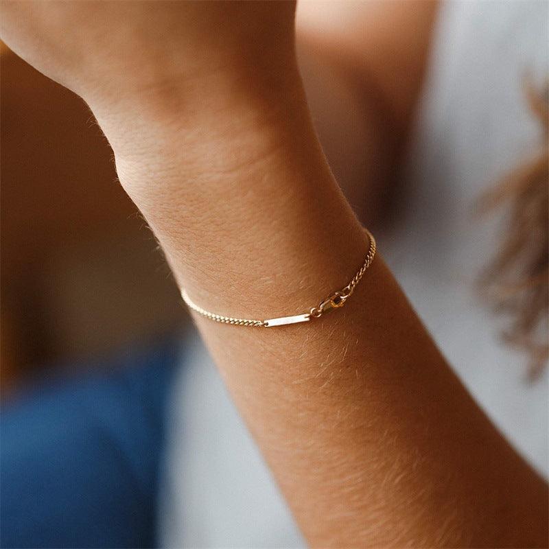 Minimalist gold chain necklace perfect for layering or standalone wear, ideal for both casual and formal outfits.