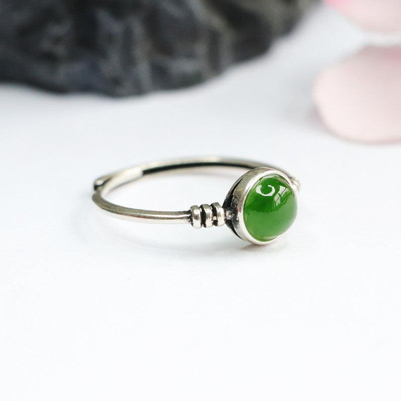 Natural green jade stone set in sterling silver, a timeless and meaningful accessory.