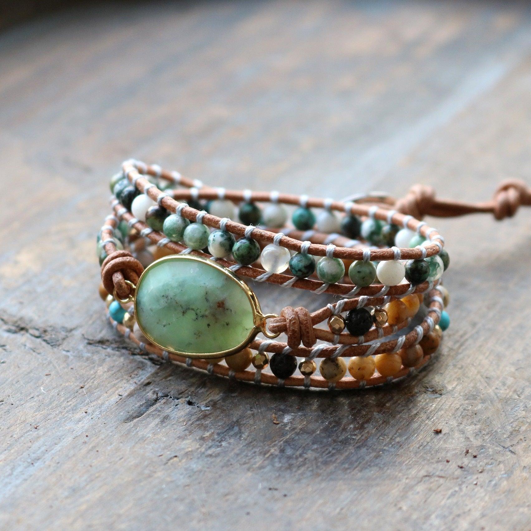 Natural jade stone bracelet with leather wrap, symbolizing harmony and prosperity
