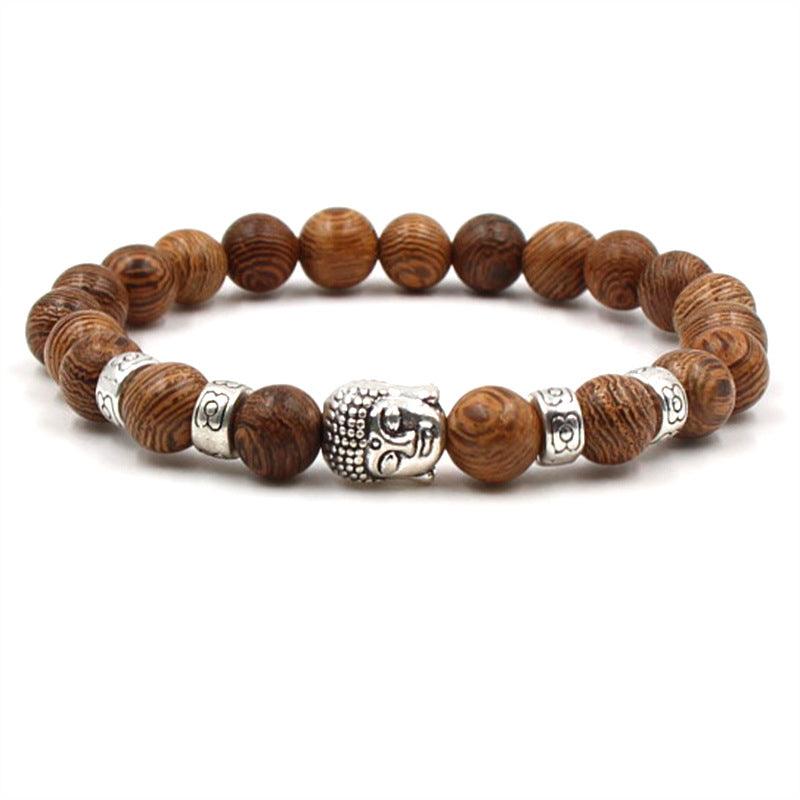 Natural wood Buddha bracelet with silver accents, symbolizing groundedness and spiritual wisdom.