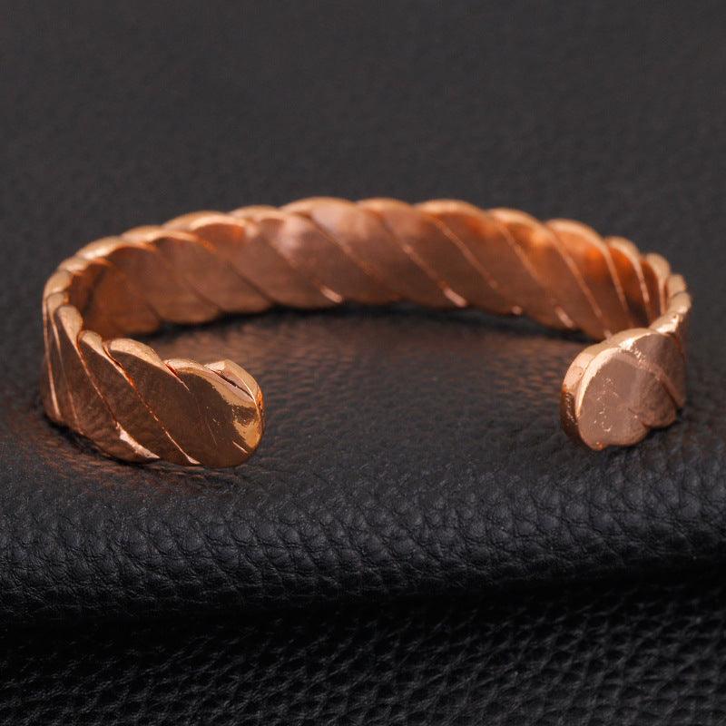 Simple yet chic twisted copper bracelet with magnets, a refined accessory with potential health benefits.