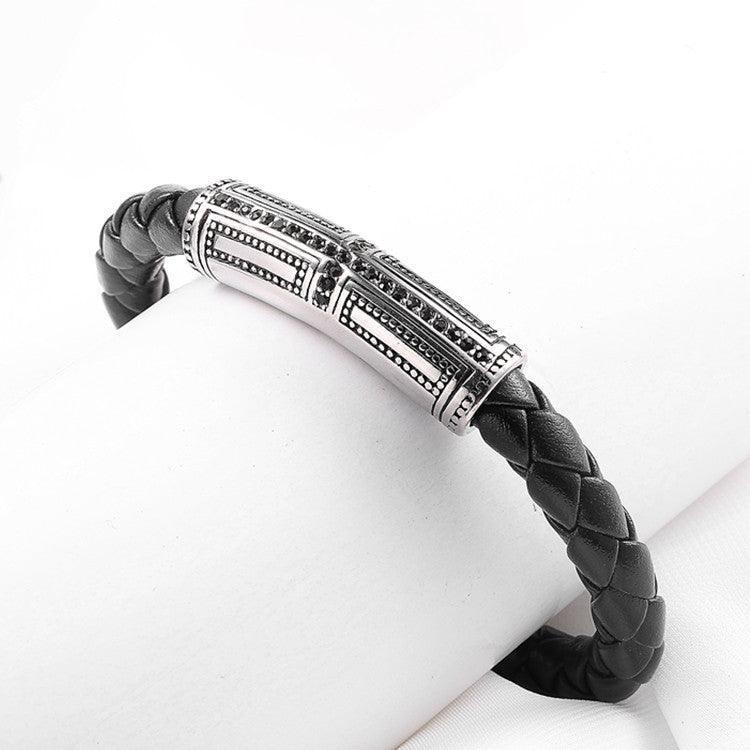 Stylish braided leather bracelet with silver clasp, ideal for everyday wear.