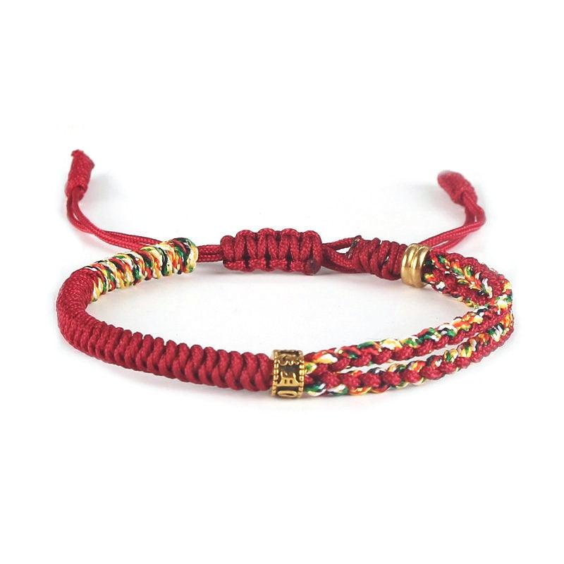 Tibetan-style red bracelet with multicolored accents, symbolizing resilience, positivity, and a connection to Tibetan heritage.