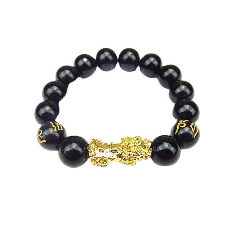 Wealth-attracting Pixiu bracelet crafted from polished obsidian, a powerful symbol of luck and protection.