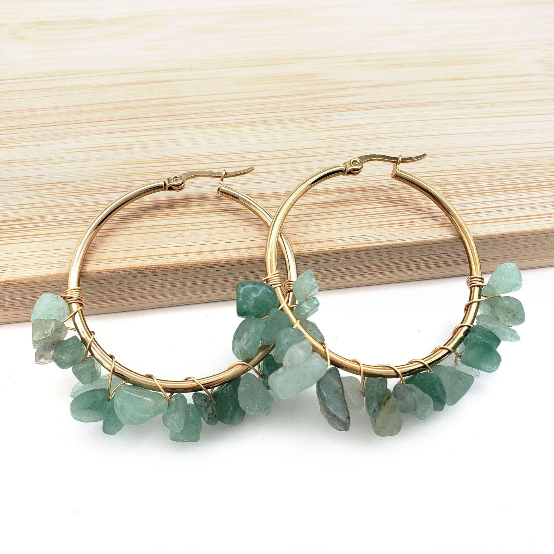 green stone earrings in this design emit a refreshing natural vibe, symbolizing vitality and hope, ideal for wearers with a love for the outdoors and a distinctive style.